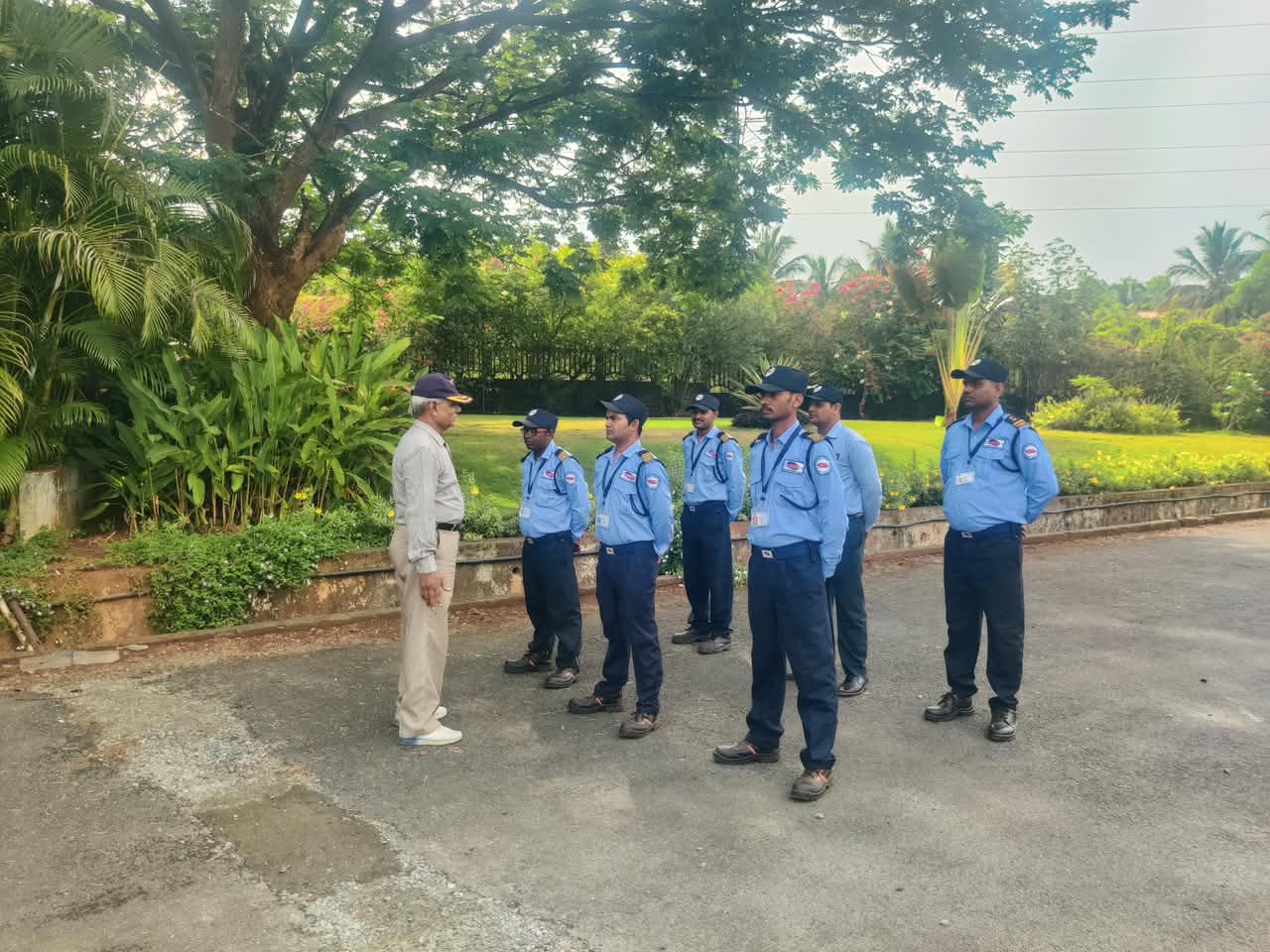 Security supervisor checking gate register books